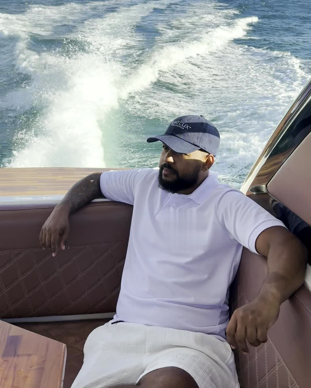 Luciano on the stern of a yacht
